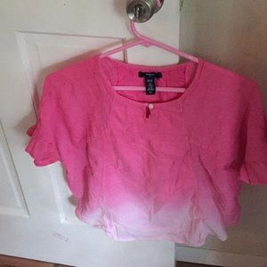 A girls pink to white ombré, lacy,flowy blouse.